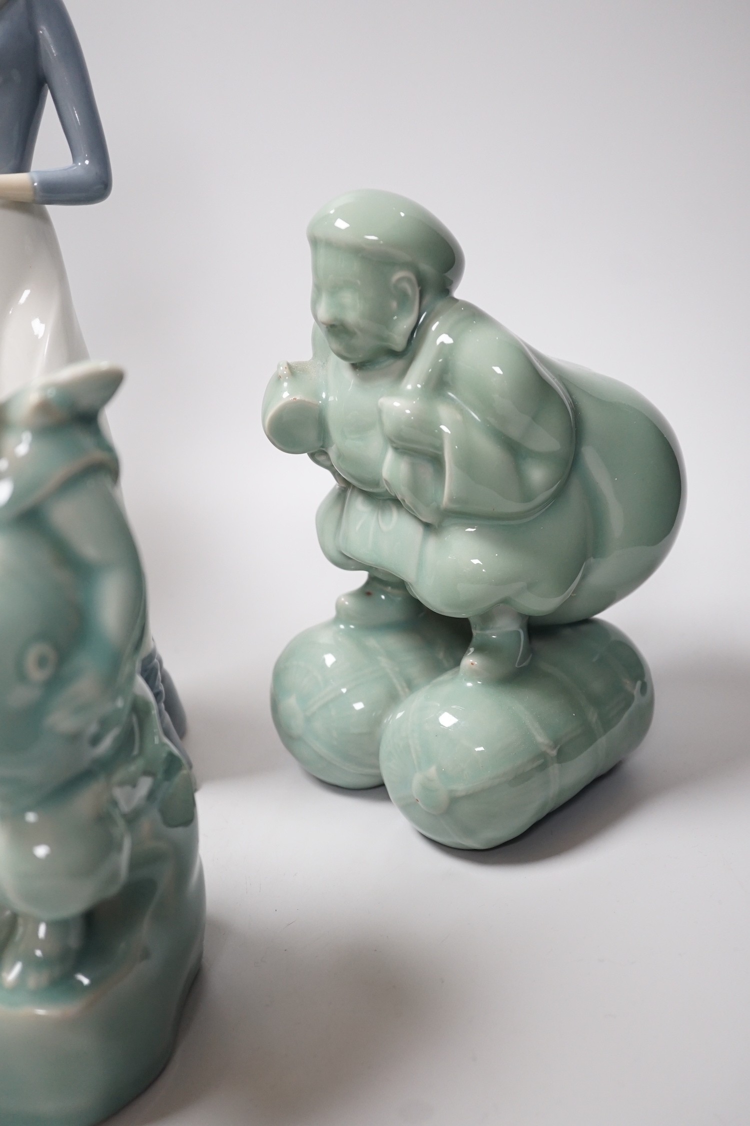 Two Nao figures, another similar and a pair Chinese celadon figures, tallest 39cm